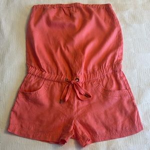 NWOT Guess romper. Still has a sticker inside. Like new.